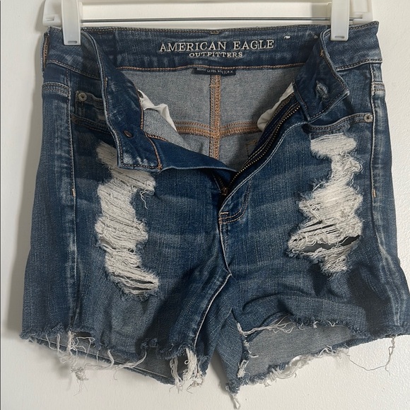 American Eagle Outfitters Pants - EUC American Eagle Next Level Stretch Blue Distressed Jean Shorts with Raw Hem